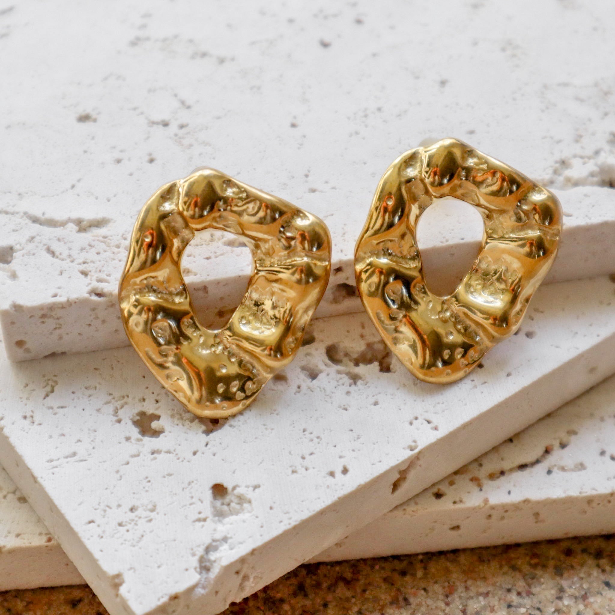 Bri statement oval 18k gold earrings hypoallergenic close up photo
