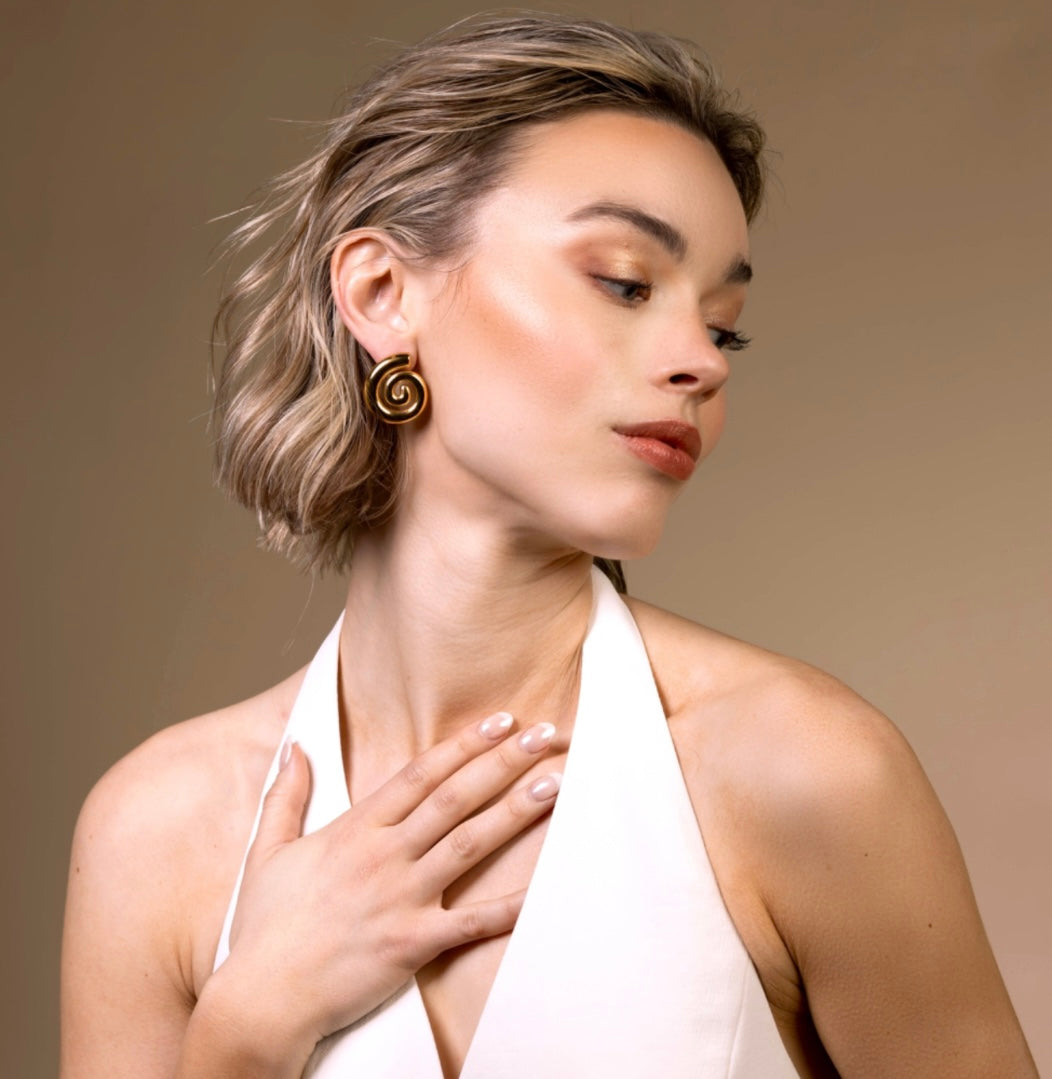 Cora spiral 18k gold hypoallergenic statement earrings seashell side model cover photo