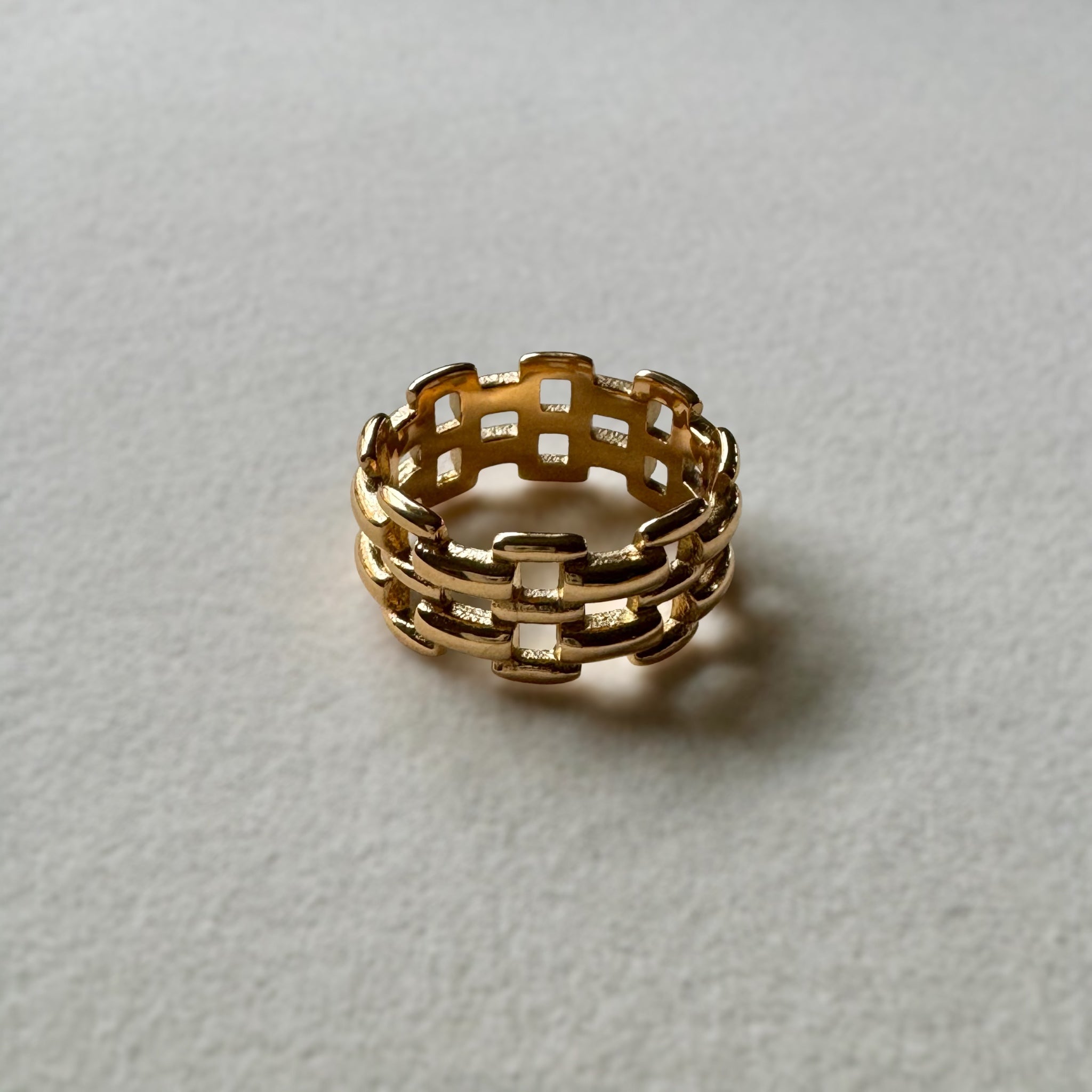 woven chain link ring cover photo 18k gold hypoallergenic trendy tarnish free on tray