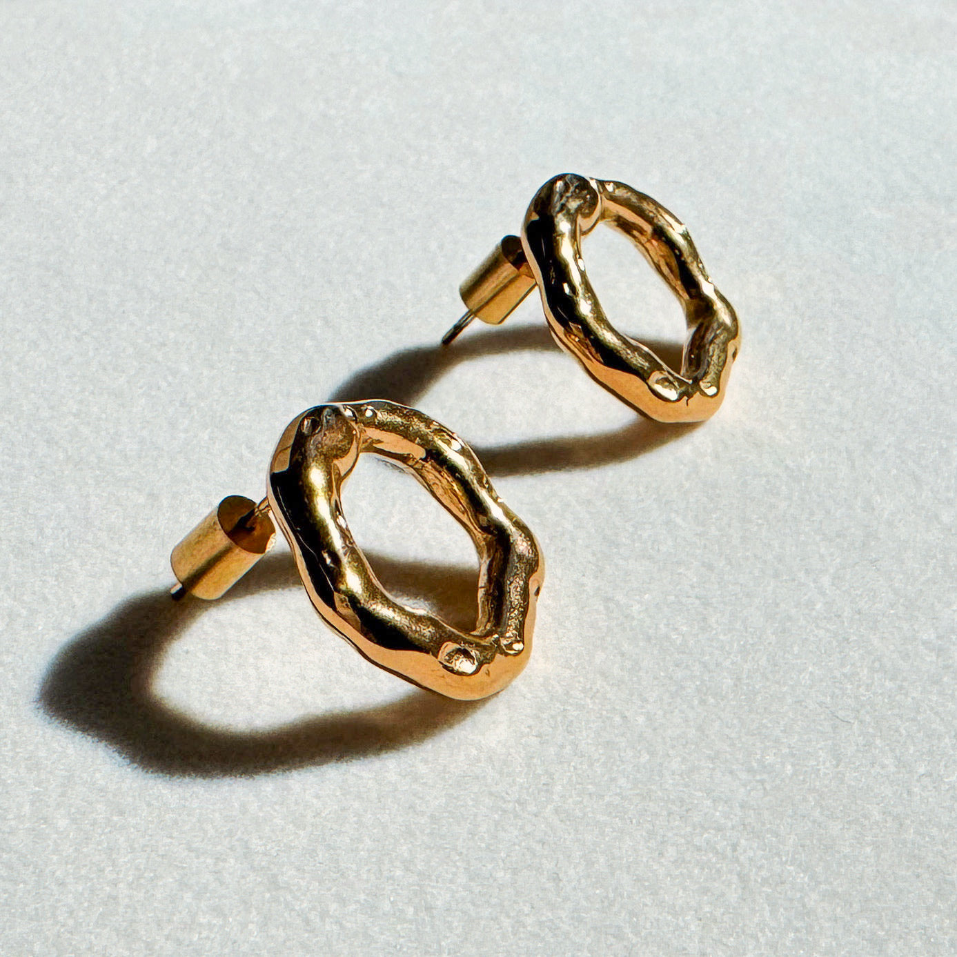 18k gold stainless steel statement earrings oval shaped nova side photo