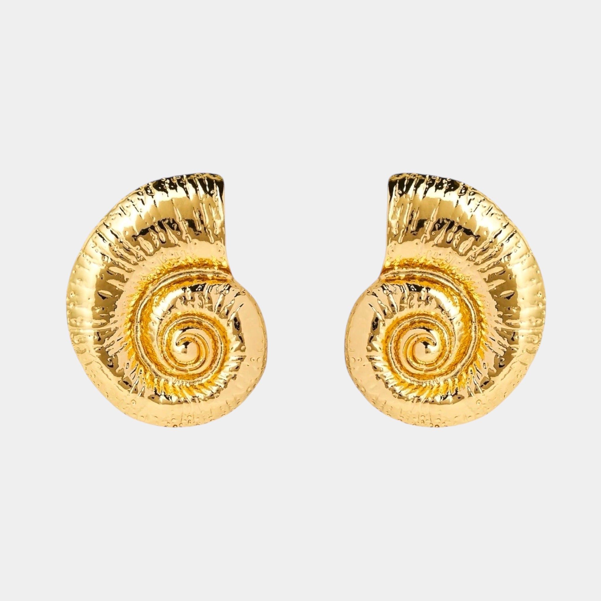 Clara shell 18k gold earrings front photo sea